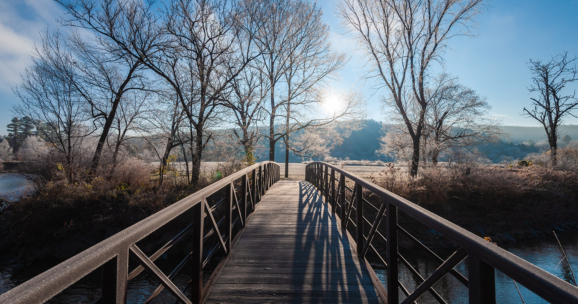 Bridge over river in early winter